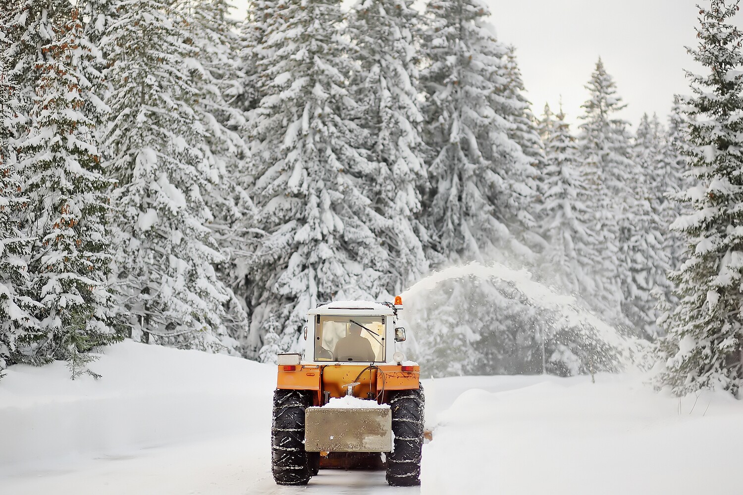 A,Snowplow,Truck,Clearing,A,Snow-covered,Road,In,The,European